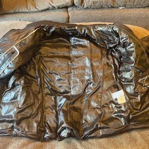 Black puffer jacket.